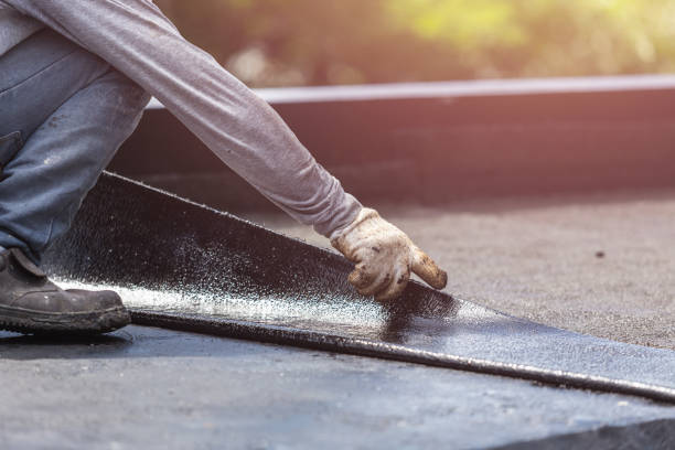 Professional Basement Waterproofing technician working in Washington, IL